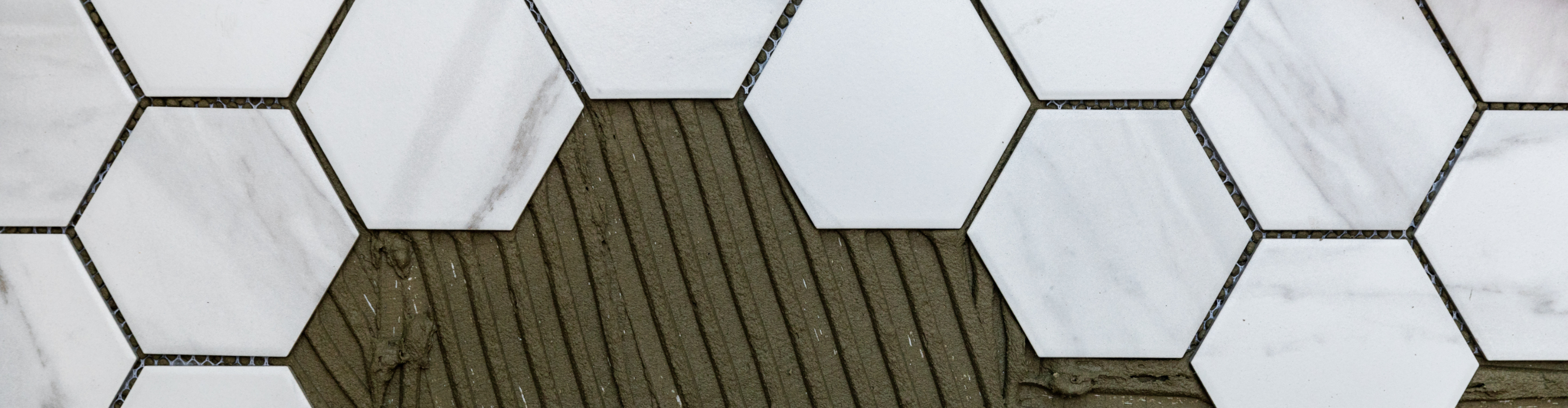 hexagon marble tiles close up during installation